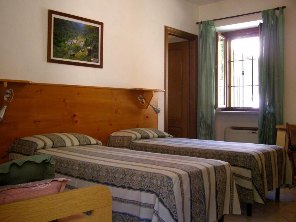 L'Antico Borgo Rooms Rental Caprie Szoba fotó